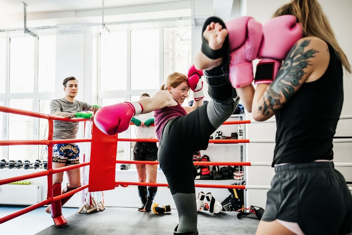 Women Fighting Muay Thai for conditioning and cardio